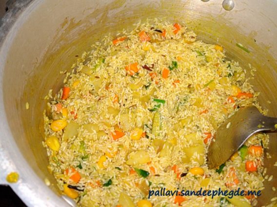 Vegetables Pulao: After adding rice in the pressure cooker